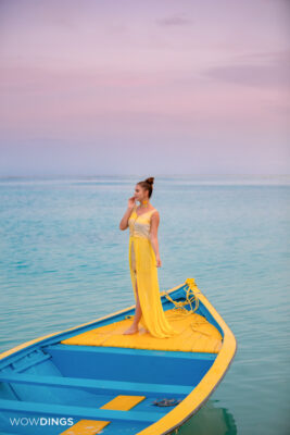 girl on the boat in tellow dress