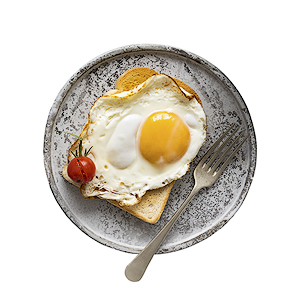 Fried egg on toast contact a food photography