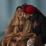 Beautiful traditional Muslim bride and groom chatting in a delhi wedding