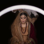Beautiful muslim bride getting ready at a make up studio in delhi for her wedding