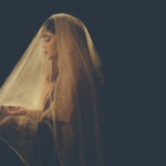 Beautiful veiled Muslim bride in sunlight bridal portrait at a muslim wedding in delhi by wowdings