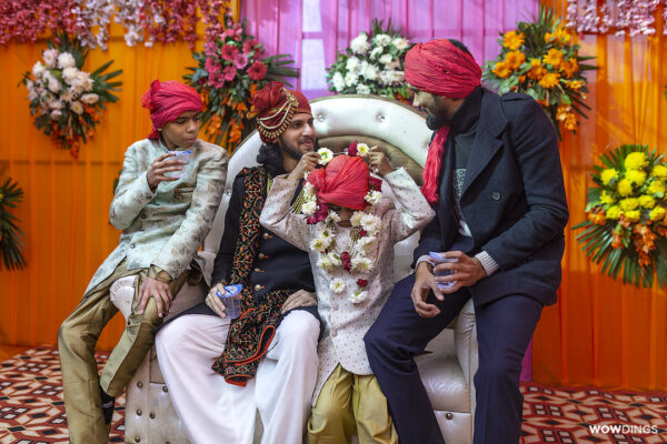 Muslim groom chatting with Friends and family in a Delhi wedding