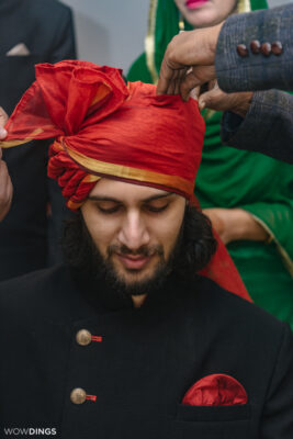 Red Pagdi Safa Bandhai of groom at a Muslim wedding in Delhi