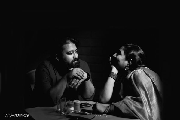 bengali couple sitting in coffee house