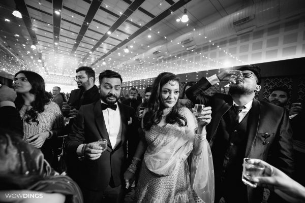 couple getting drunk at indian wedding in delhi candid photography