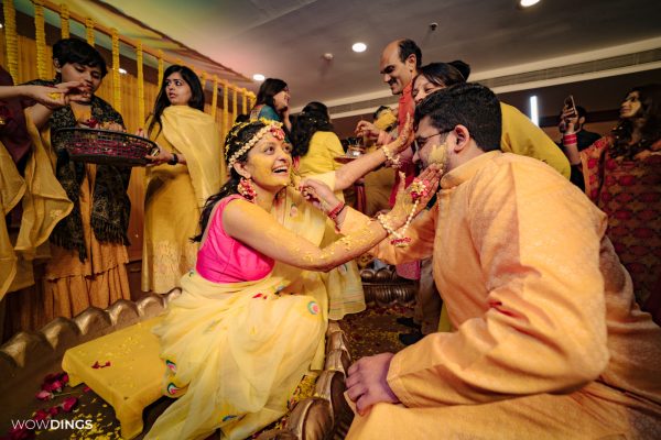 bride celebrating haldi ceremony in wedding event