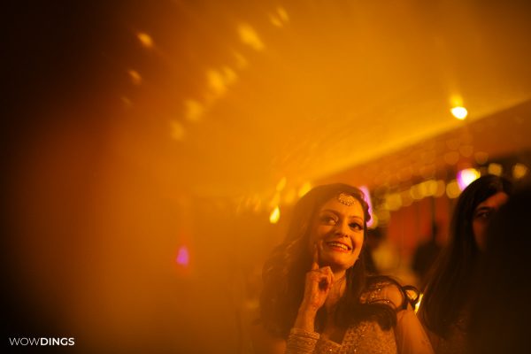 Casual portrait of a beautiful bride on her sangeet ceremony in Delhi candid wedding photography