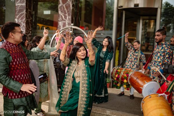 people dancing at Mehndi and sangeet Ceremony of Delhi bride candid wedding photography