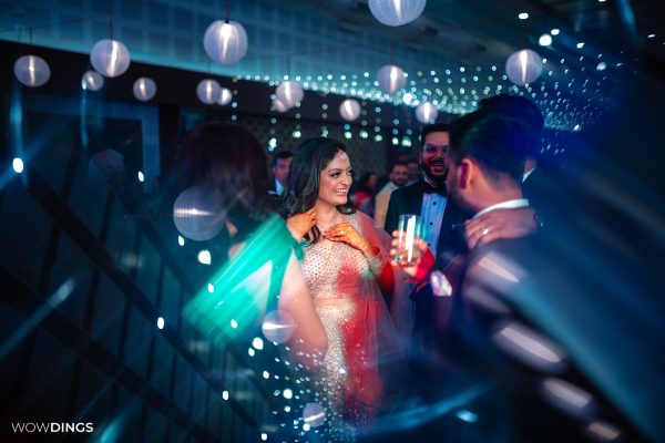 candid moment of bride dancing at a delhi wedding sangeet ceremony candid photography