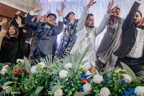 friends dancing in wedding sangeet night in delhi candid photography