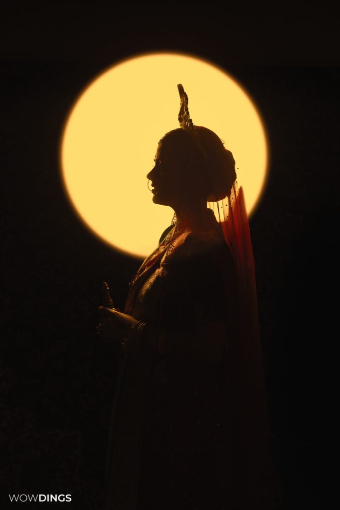 bengali bride silhouette photography by subinoy das. cross culture wedding in kolkata