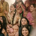 Muslim bride's with bridesmaid during a mehendi ceremony