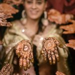 Muslim bride's with bridesmaid during a mehendi ceremony
