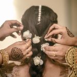 Muslim bride's with bridesmaid during a mehendi ceremony