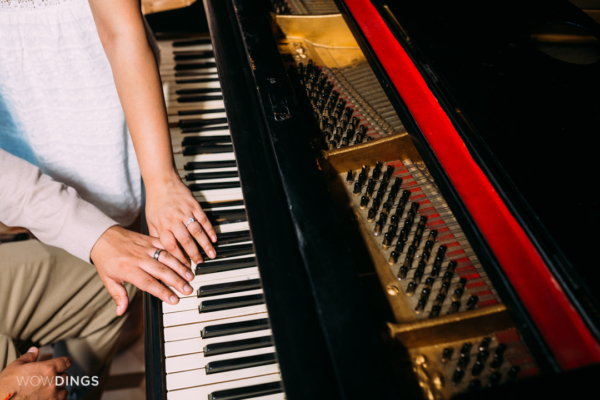 couple playing piano