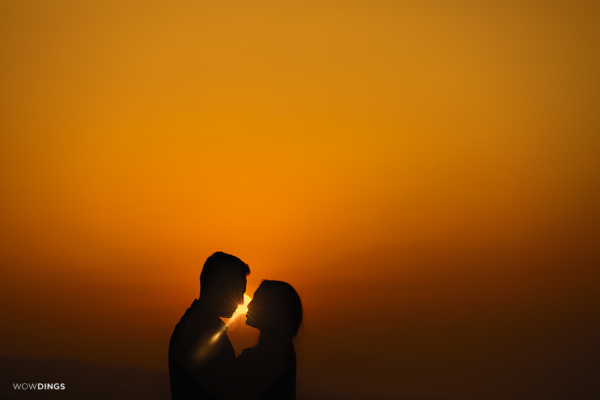 silhouettes of couple under the sun
