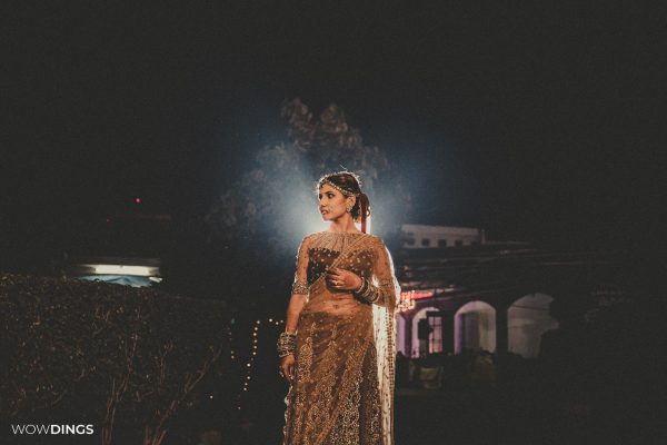 bride flaunting her wedding saree