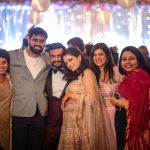 friends and family photos of bride at a delhi wedding sangeet ceremony candid photography Superman got hitched candid photography