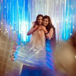 sisters dancing at a delhi wedding sangeet ceremony candid photography