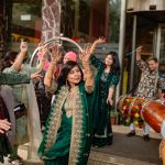 people dancing at Mehndi and sangeet Ceremony of Delhi bride candid wedding photography