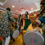 people dancing on dhol beats at Mehndi Ceremony of Delhi bride candid wedding photography
