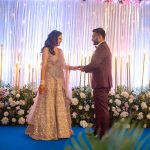 Couple exchanging rings at engagement ceremony at a delhi wedding candid photography