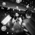 casual moment of bride at a delhi wedding sangeet ceremony candid photography