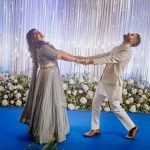 couple dancing on sangeet ceremony at an indian wedding in delhi on engagement day candid photography